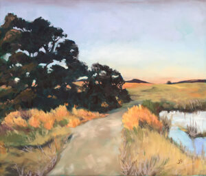 A painting of a dirt road near the water